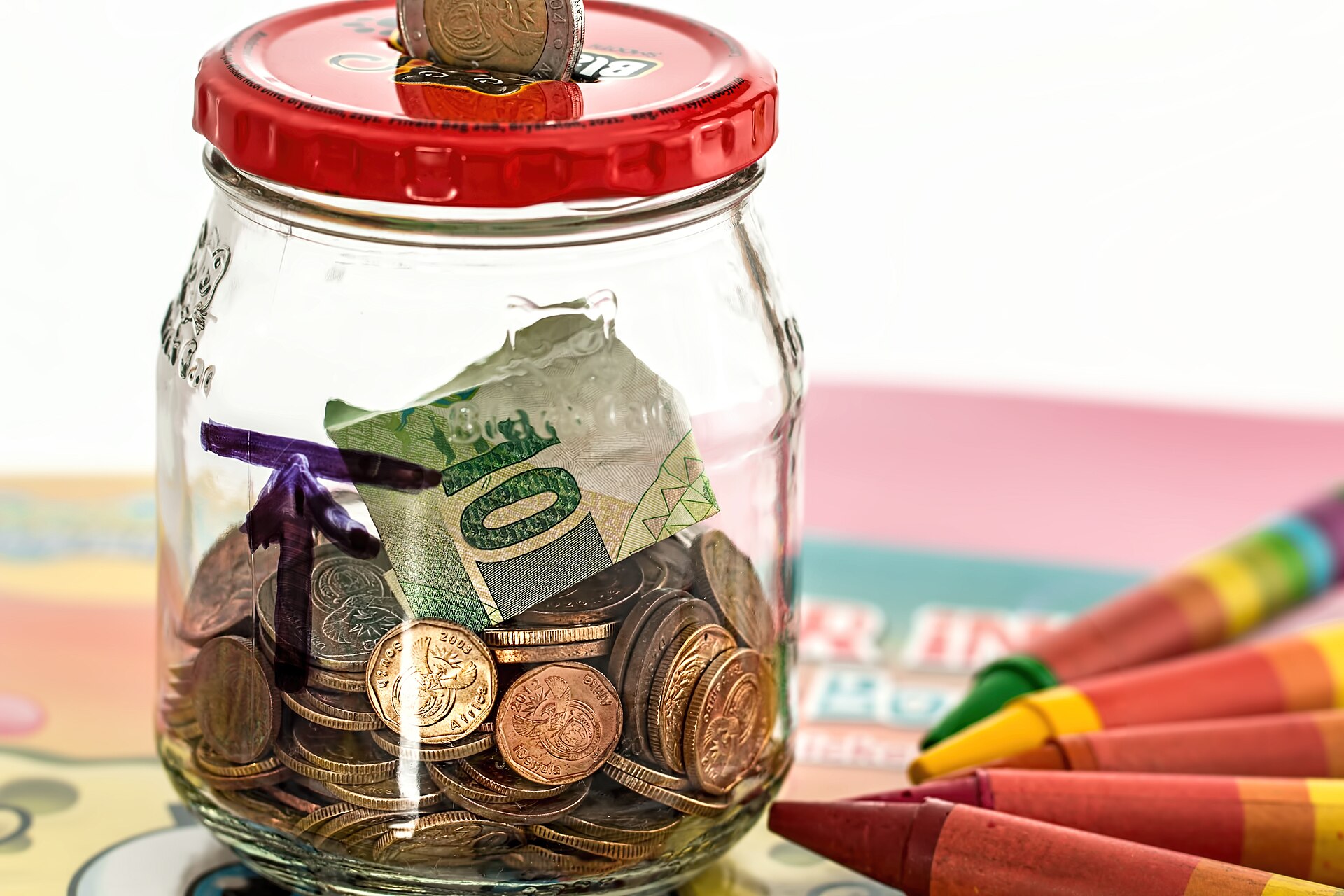A piggy bank representing monthly child benefit payments