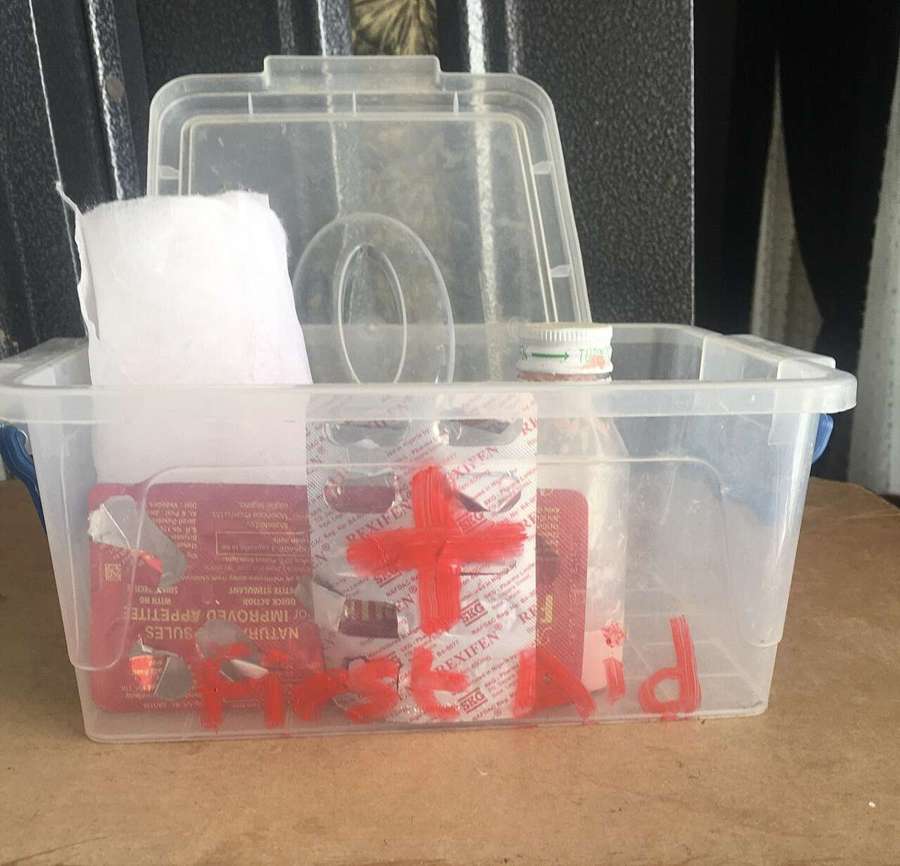 A plastic first aid box