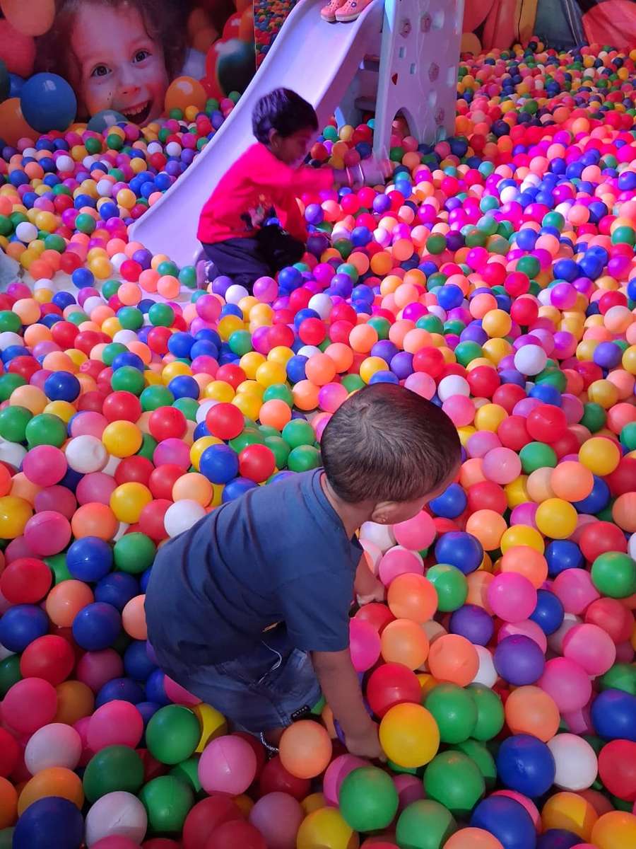 Baby playing with balls