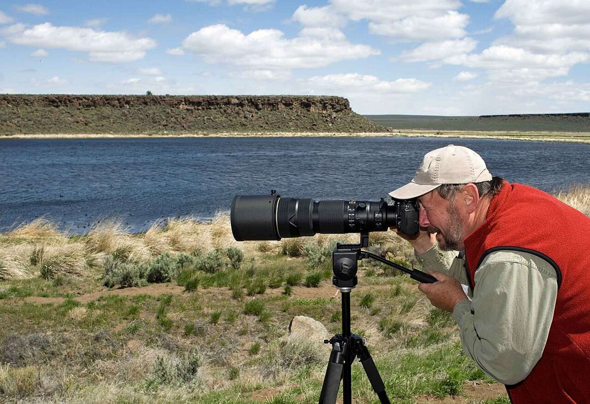 A photographer with a camera