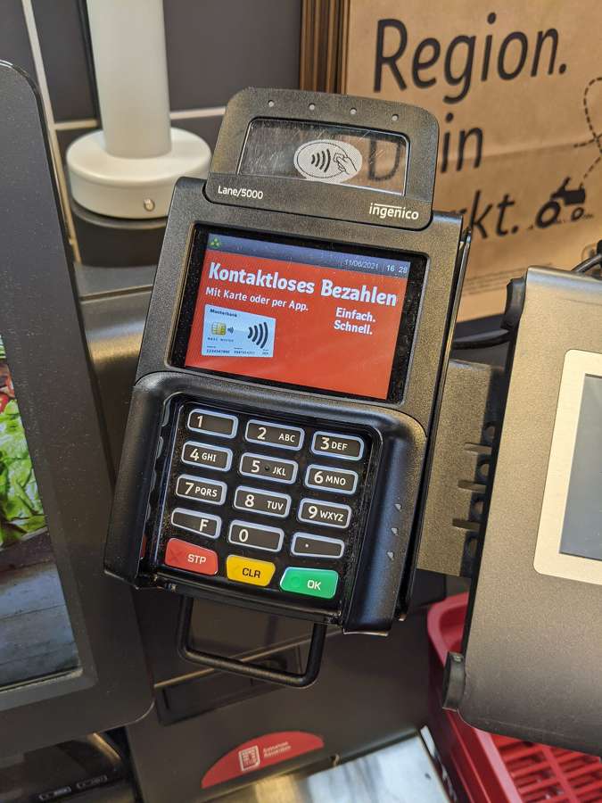 A contactless payment terminal at a self-checkout - BLIK and contactless are Poland's payment defaults