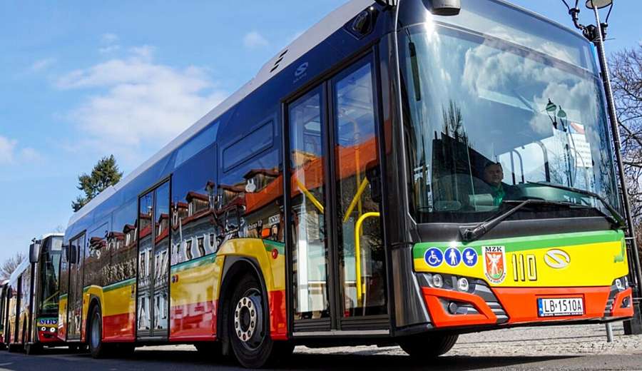 Colourful MZK city bus in Biała Podlaska on a sunny day