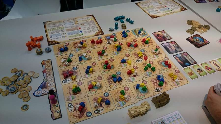 Five Tribes board game laid out on a café table