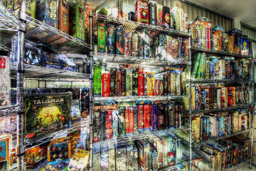 Shelves packed with hundreds of board games