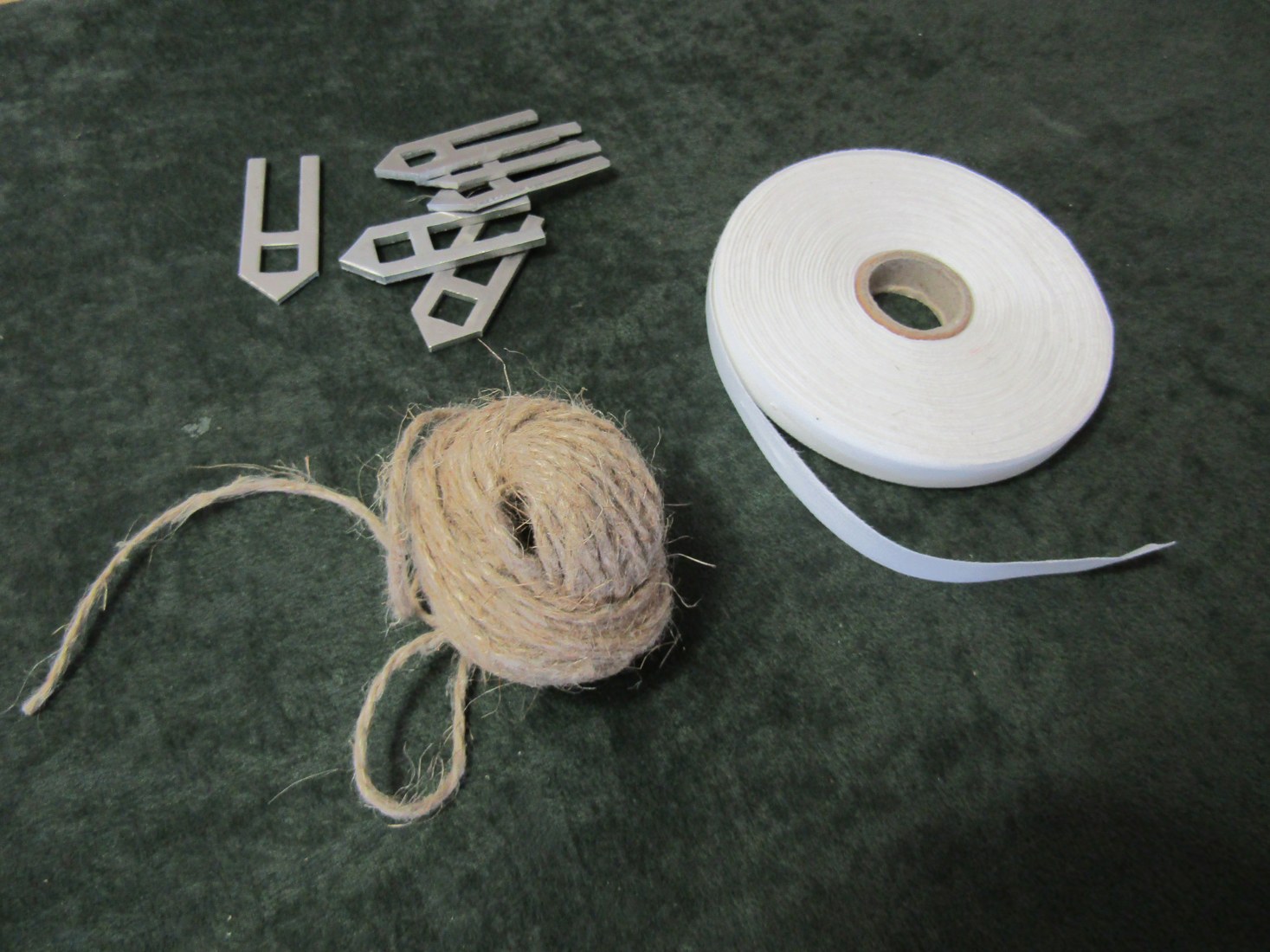 Bookbinding sewing supplies including ribbons, cord and small fittings