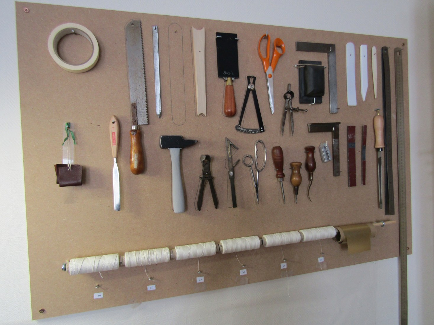 Bookbinding hand tools arranged in a Normandy workshop in September 2016