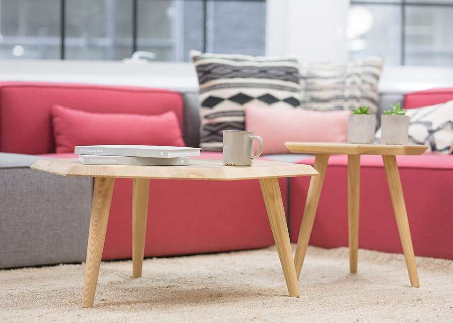 Sofa and coffee tables in Toronto photographed by Sophia Baboolal, illustrative furniture rather than a Polish disposal site