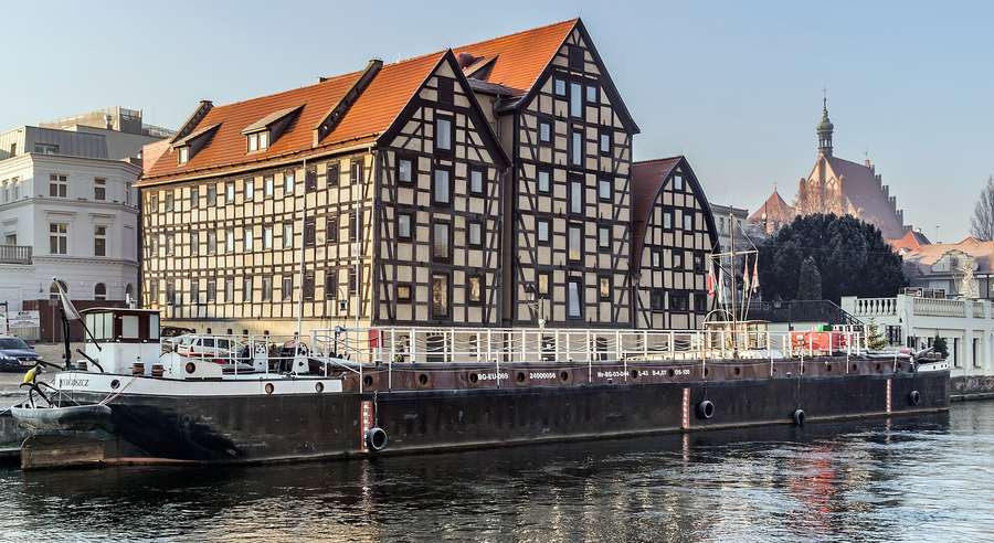 Half-timbered granaries standing over the Brda river in Bydgoszcz