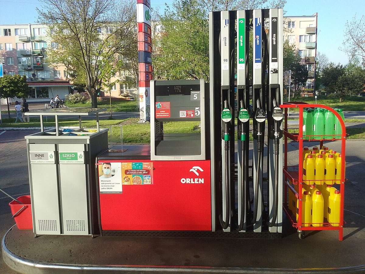 A Polish petrol station pump with petrol and diesel nozzles