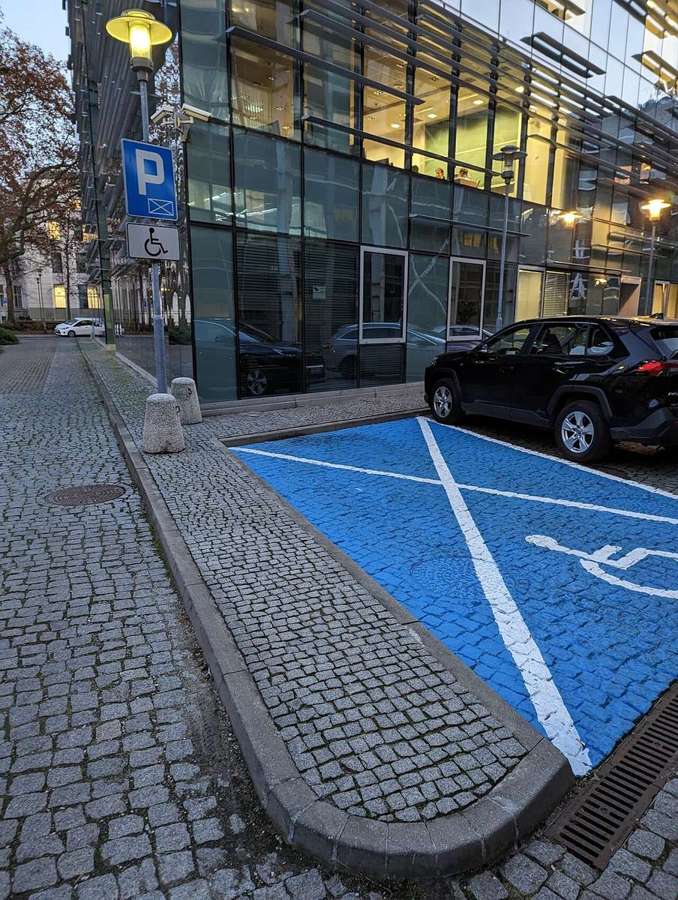 Reserved parking space for disabled drivers in Poland