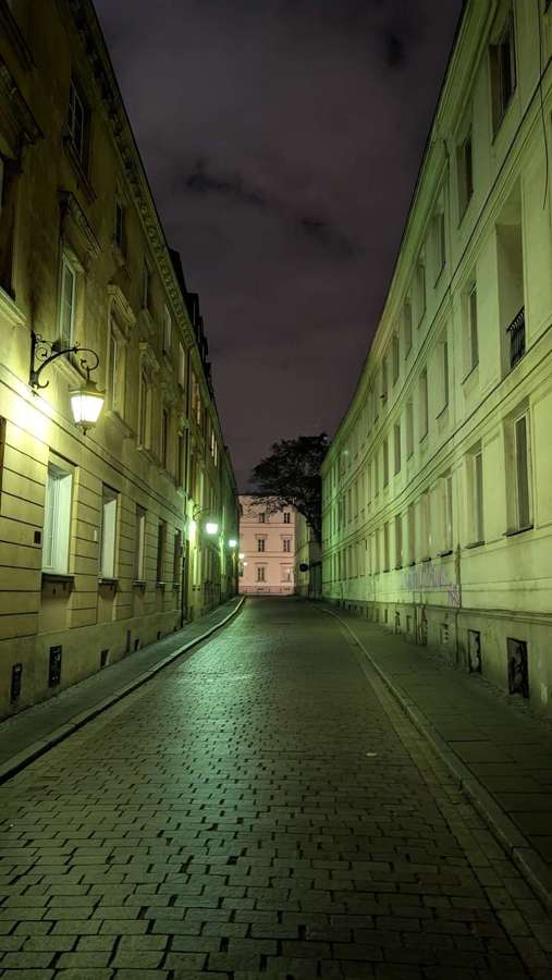 Kapitulna Street in Warsaw's old town at night - consent in Poland has a clear legal floor