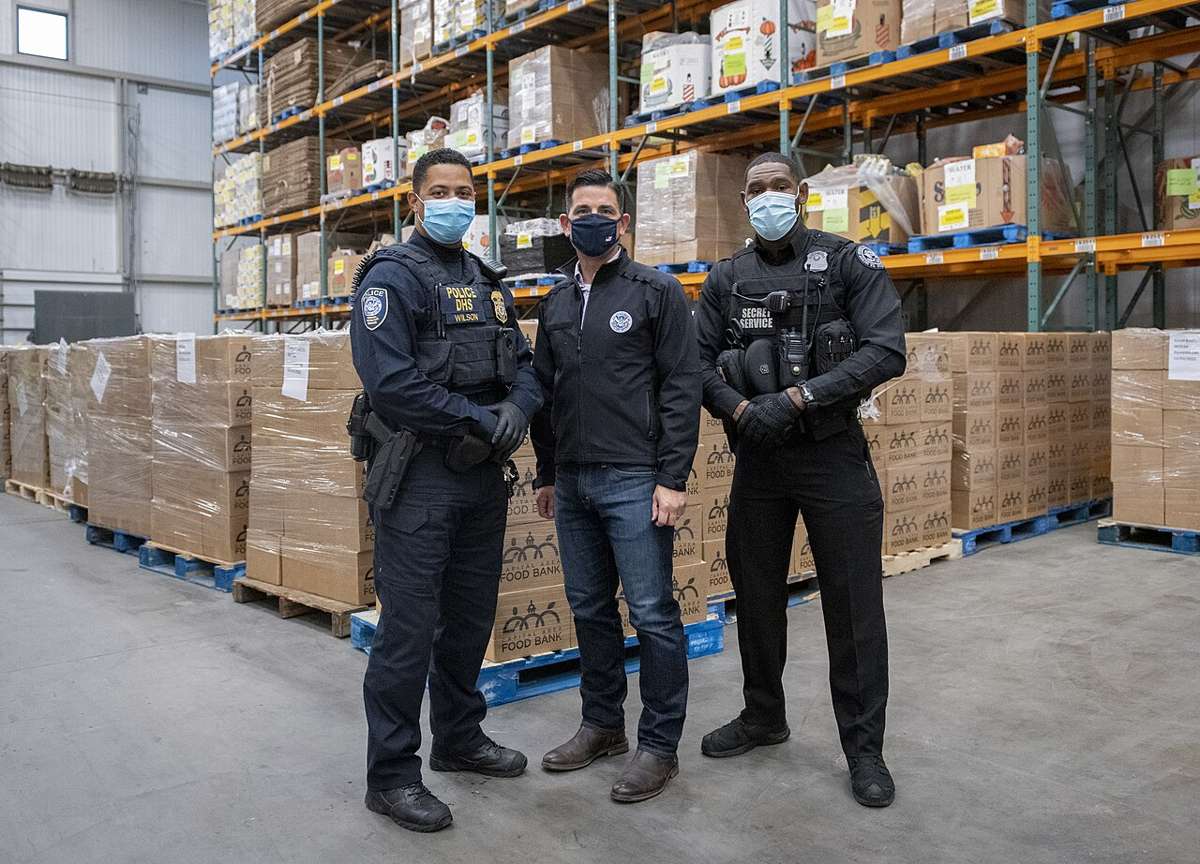 Volunteers sorting food at a food bank