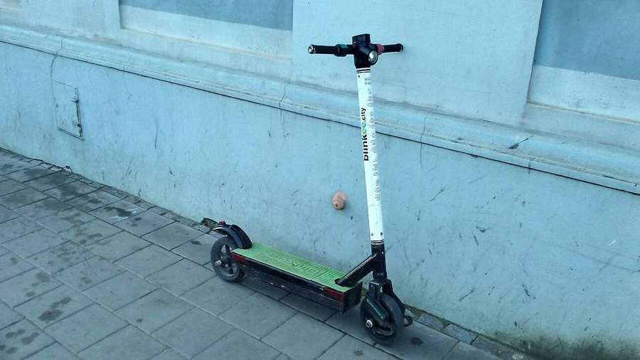 Rented electric scooters on a street in Poland