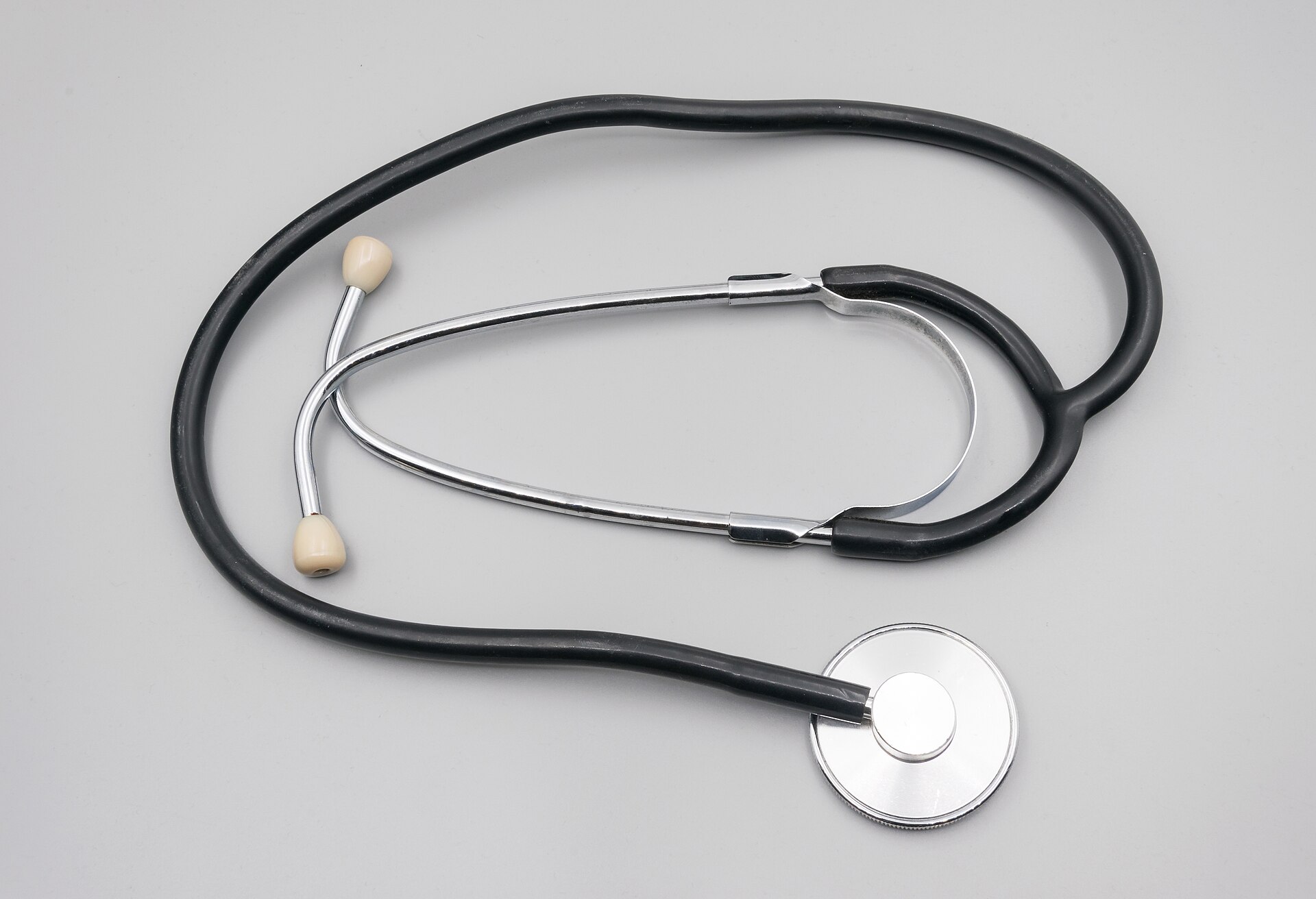 A stethoscope on a plain surface