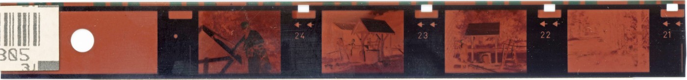 A developed strip of 110-format negative film