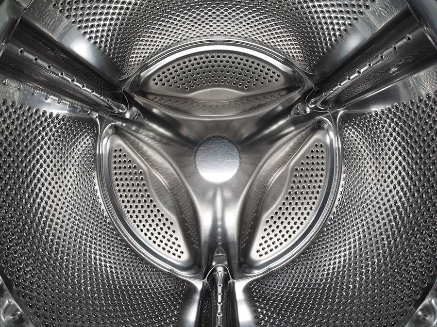 The drum of a front-loading washing machine, seen from inside