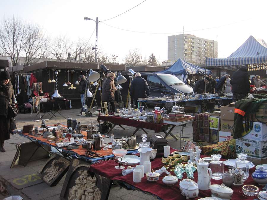 Stalls with porcelain, lamps and antiques at the Bazar na Kole flea market in Warsaw