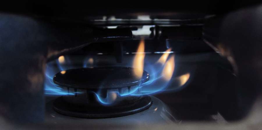 Gas stove burner photographed by Lisa Redfern, illustrative only and never a method for testing a leak