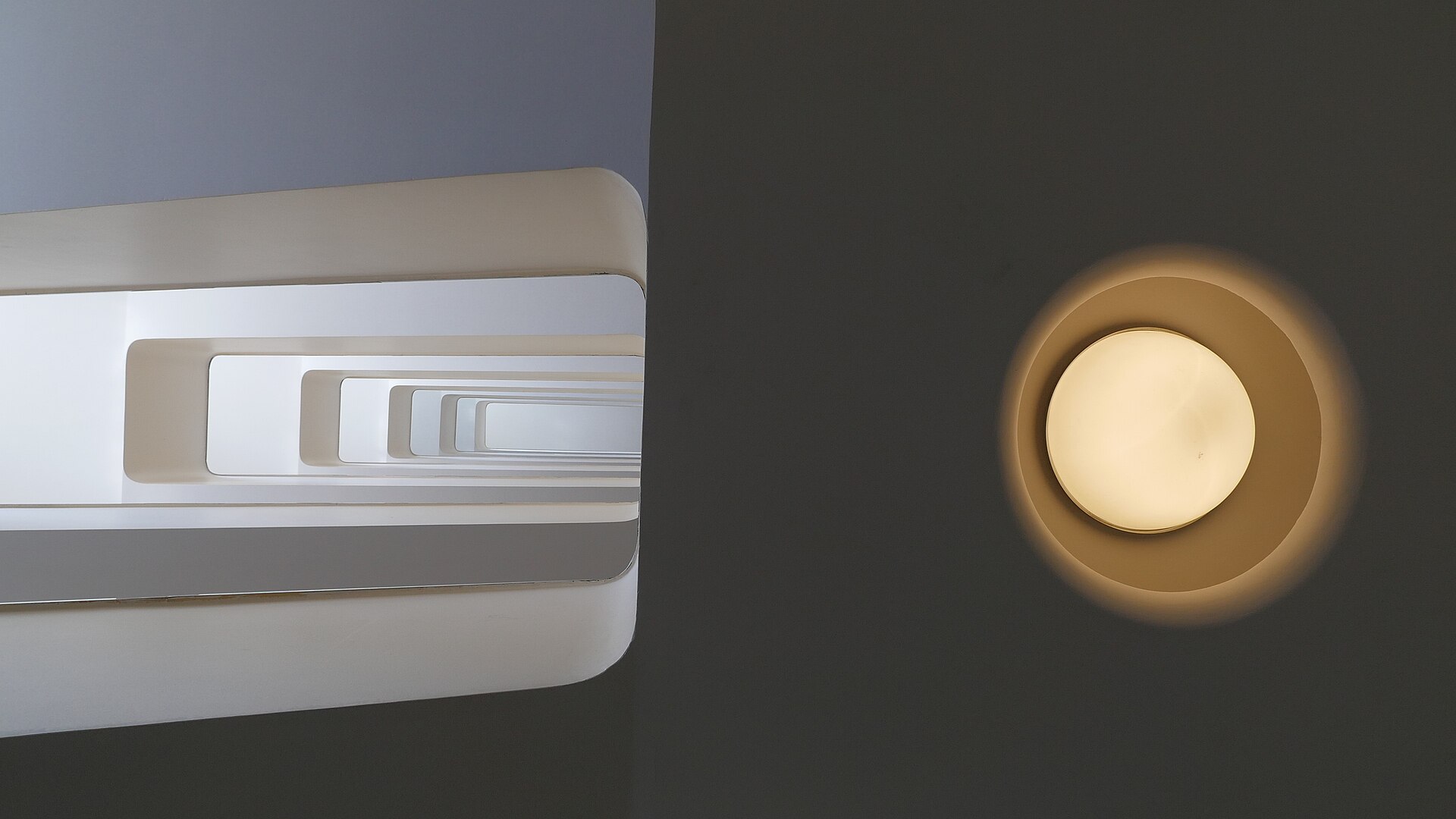 The white modernist staircase of the Bankowiec, the former BGK residential building in Gdynia