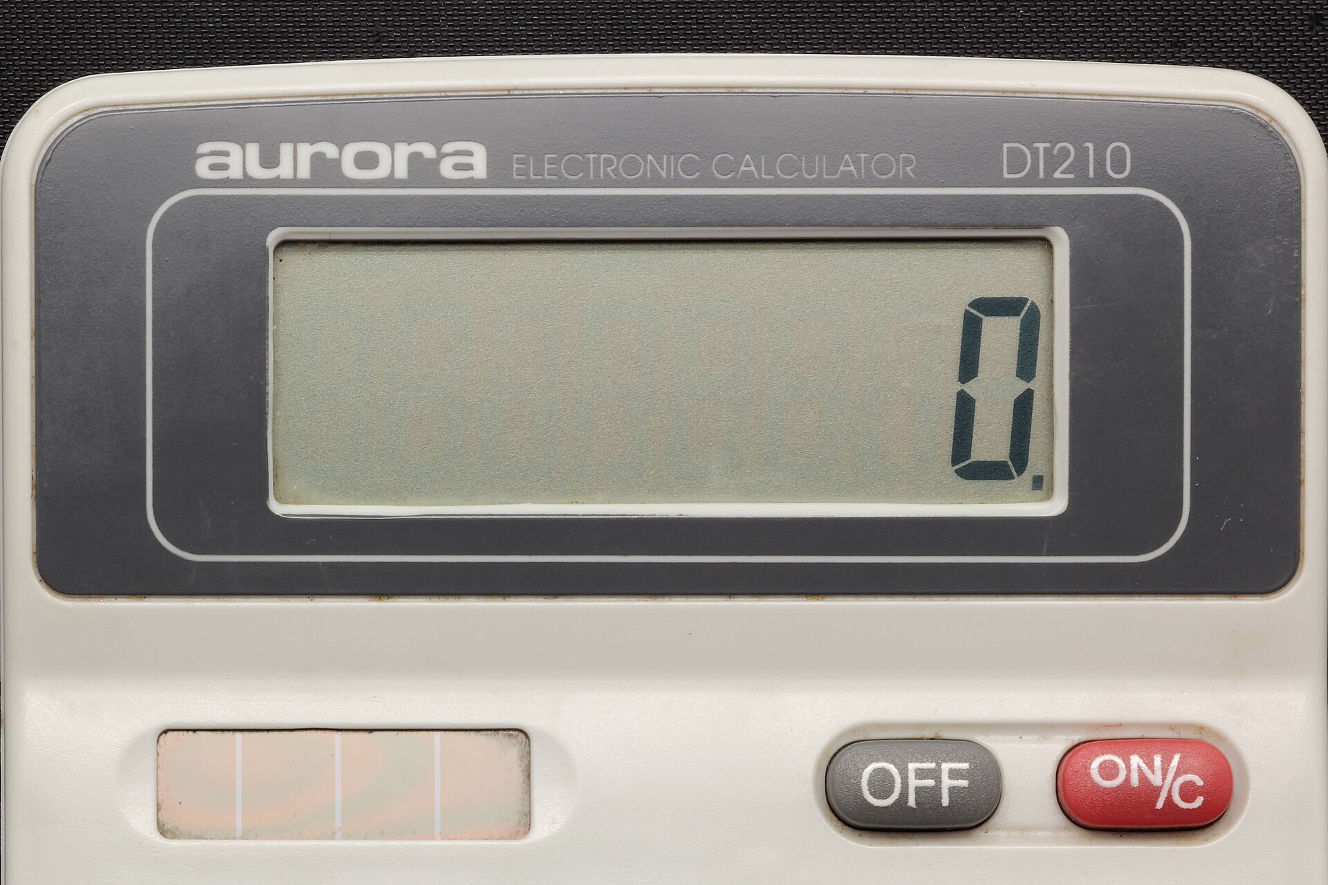 A calculator beside paperwork