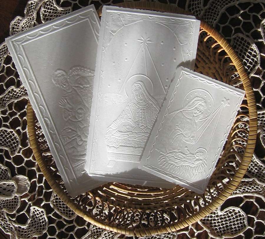 Opłatek - the embossed Christmas wafer broken and shared before the Wigilia meal