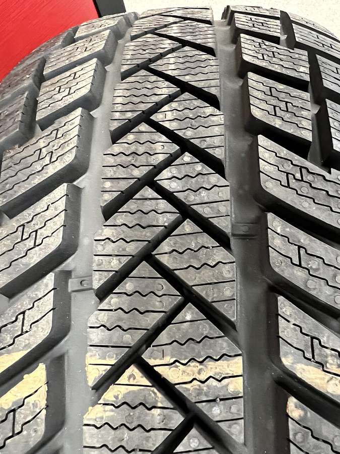 Winter tire tread - the sipes and softer compound are what stop you on frozen snow