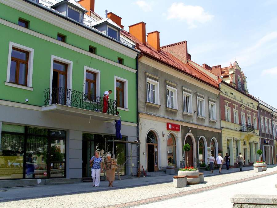 Row of tenement houses on the market square in Jasło