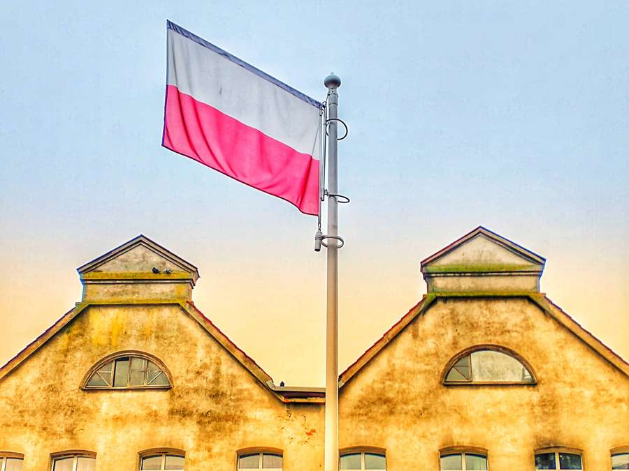 The flag of Poland - the Karta Polaka confirms belonging to the Polish Nation