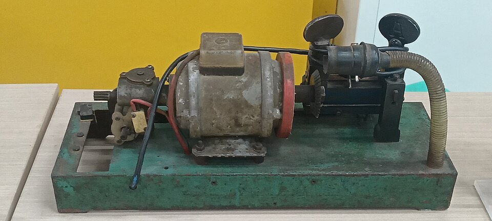 An illustrative key-cutting machine photographed in April 2024