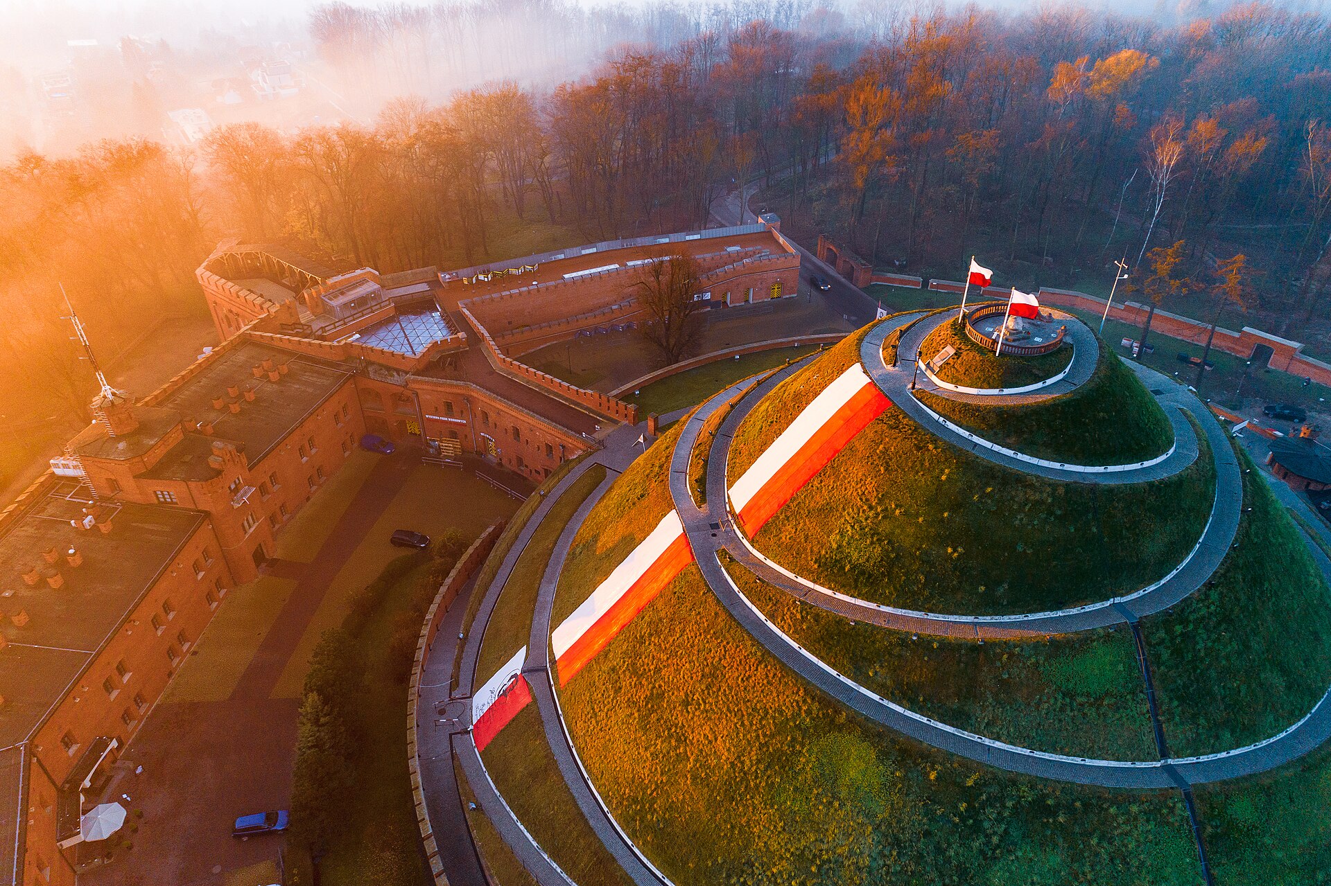 Aerial view of Kościuszko Mound in Kraków with the spiral path and Polish flags
