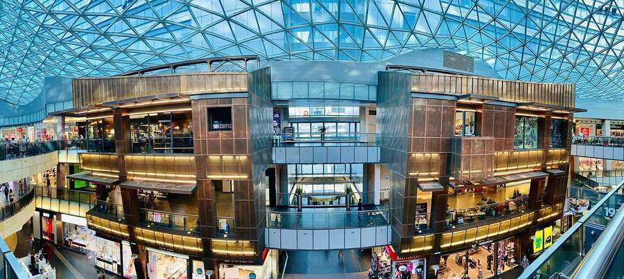 Interior of Zlote Tarasy shopping centre in Warsaw under its wavy glass roof