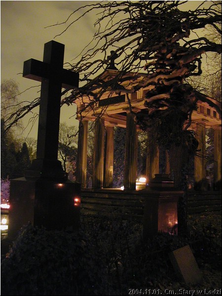 Crosses and a lit mausoleum at the Old Cemetery in Lodz on All Saints night, 1 November 2004