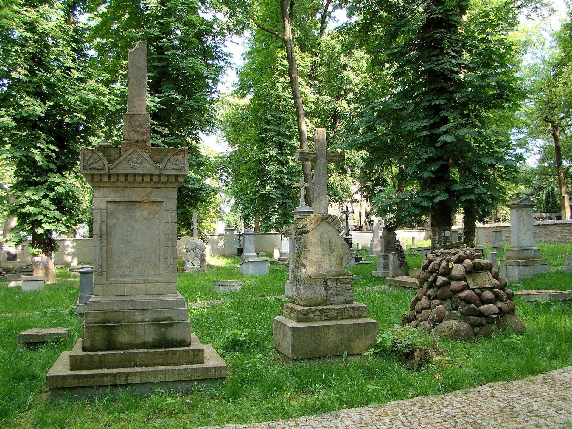 Historic gravestones under trees at the Orthodox cemetery on Lipowa street in Lublin