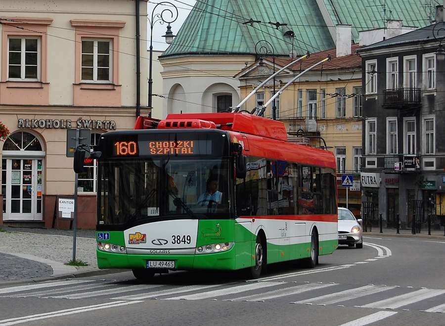 A red and green Solaris trolleybus on line 160 at Plac Lokietka in Lublin
