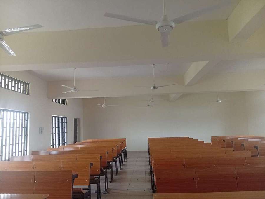 Rows of desks in a lecture theatre