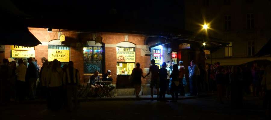 Night crowd around the zapiekanka stalls on Plac Nowy in Kraków's Kazimierz district