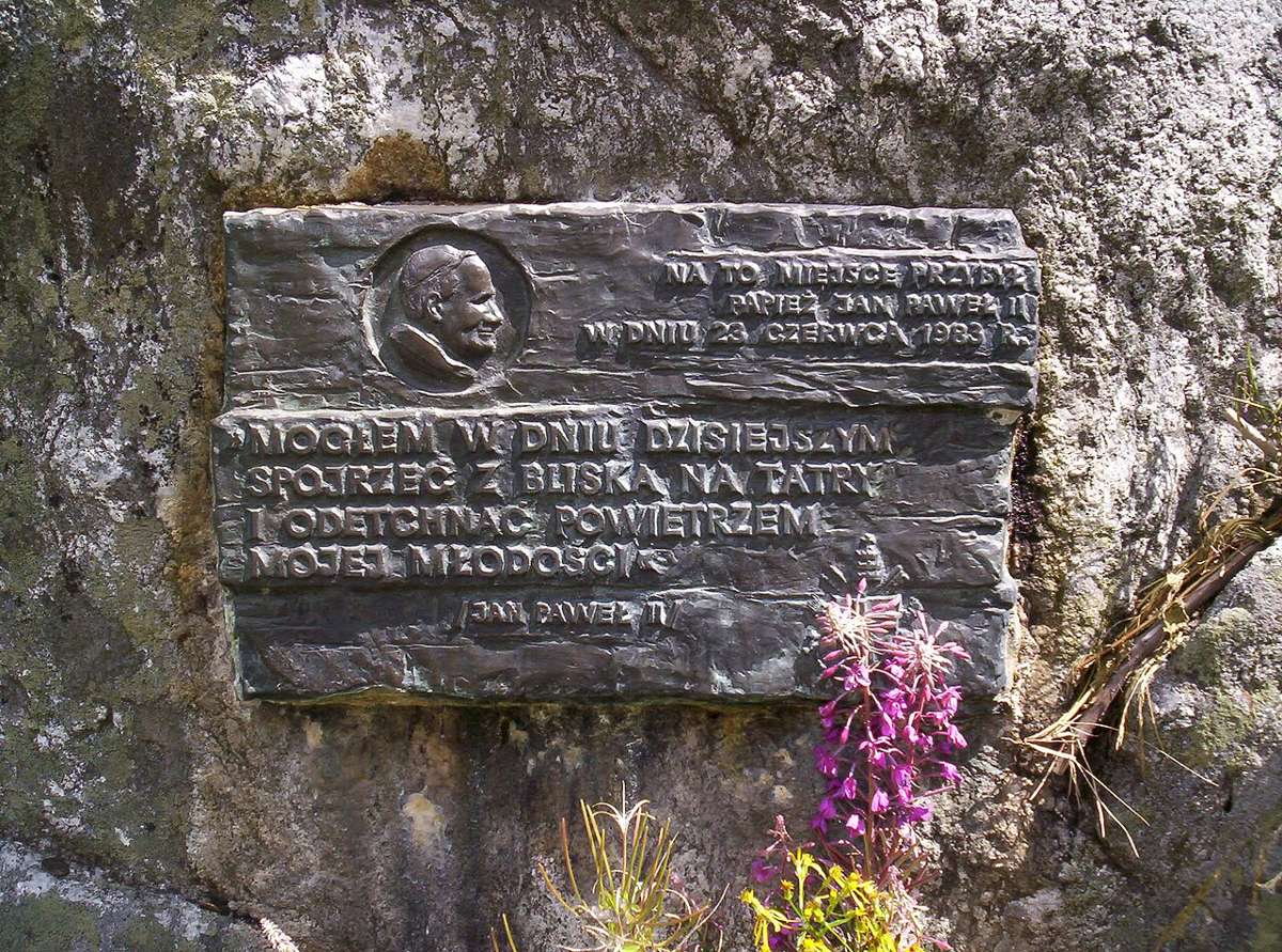 Illustrative photo of a mountain trail sign in the Tatras
