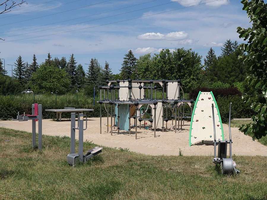 Playground with climbing frame and outdoor gym in Warsaw