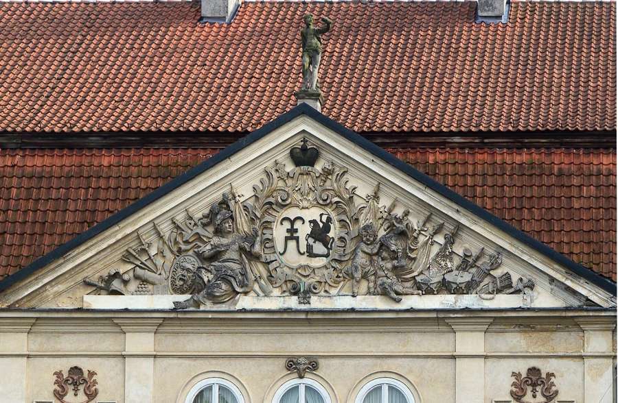 A cropped detail of the decorated palace facade at Nieborów