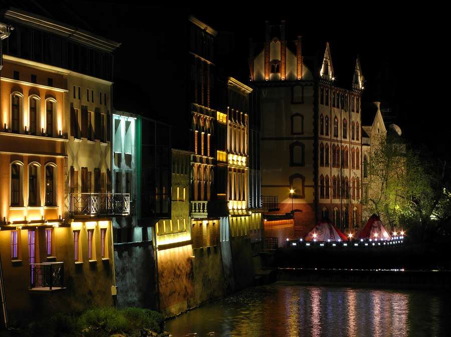 The tenements of the Młynówka canal, known as the Venice of Opole, lit at night