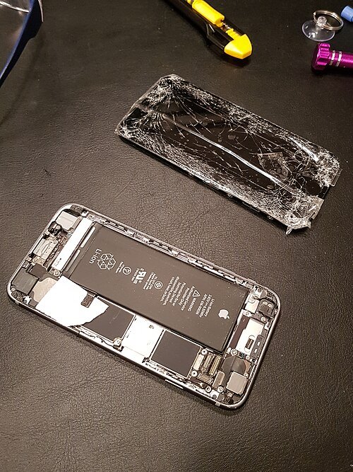 An iPhone 6s with a damaged display removed during a November 2017 repair