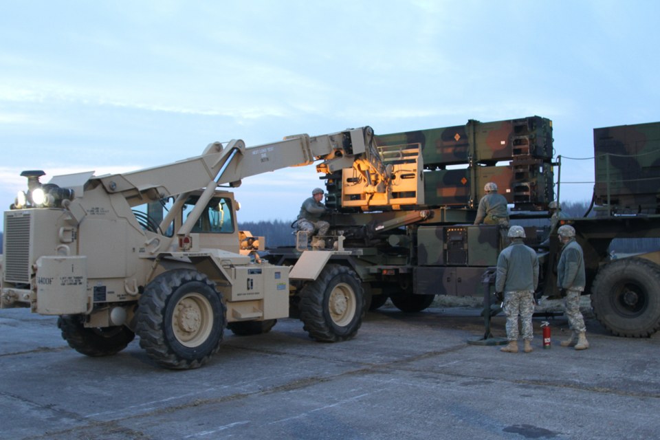 Historical US Army soldiers loading a Patriot launcher in March 2015