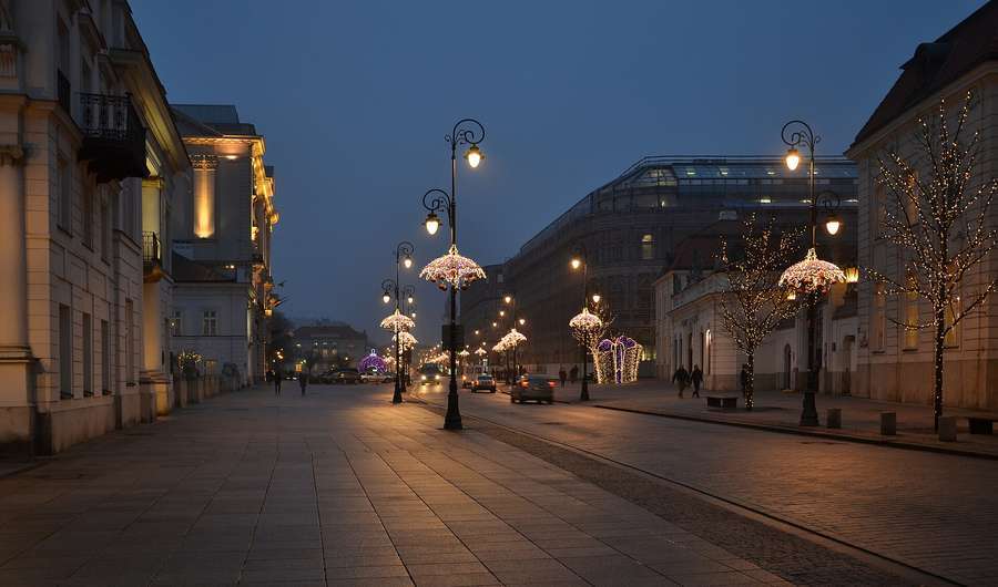 Krakowskie Przedmiescie in Warsaw on a winter evening with festive lights