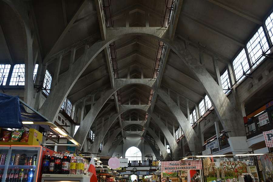 The soaring concrete arches and stalls inside Wroclaw's 1908 market hall