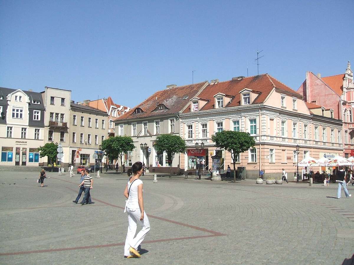 Market square with townhouses in Gniezno, Poland
