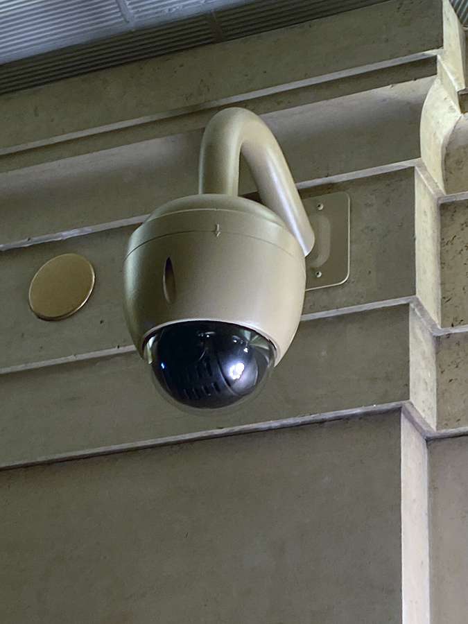 Security camera on a building facade - recording others is regulated far more tightly than recording your own conversations