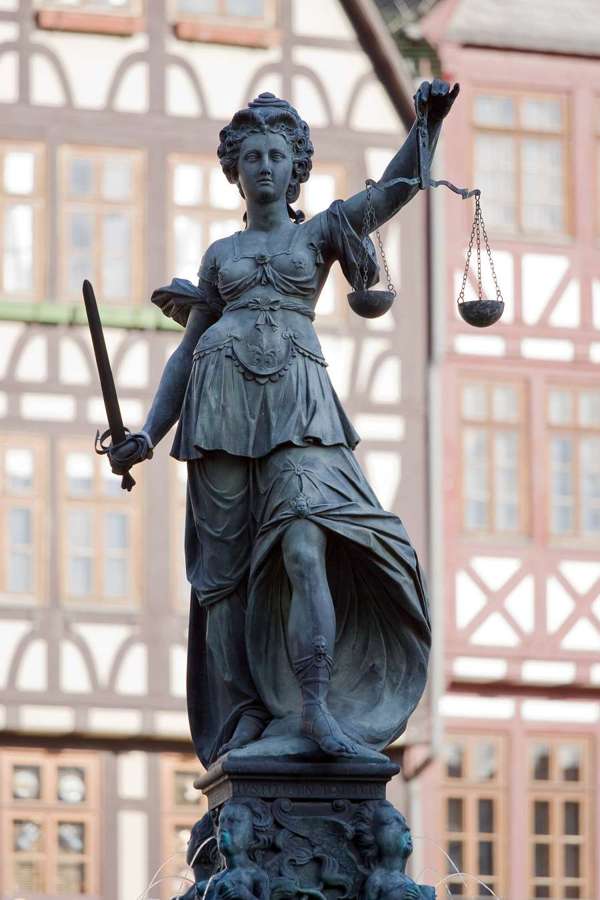 A statue of Lady Justice - Poland criminalises the economy around sex work, not the act itself