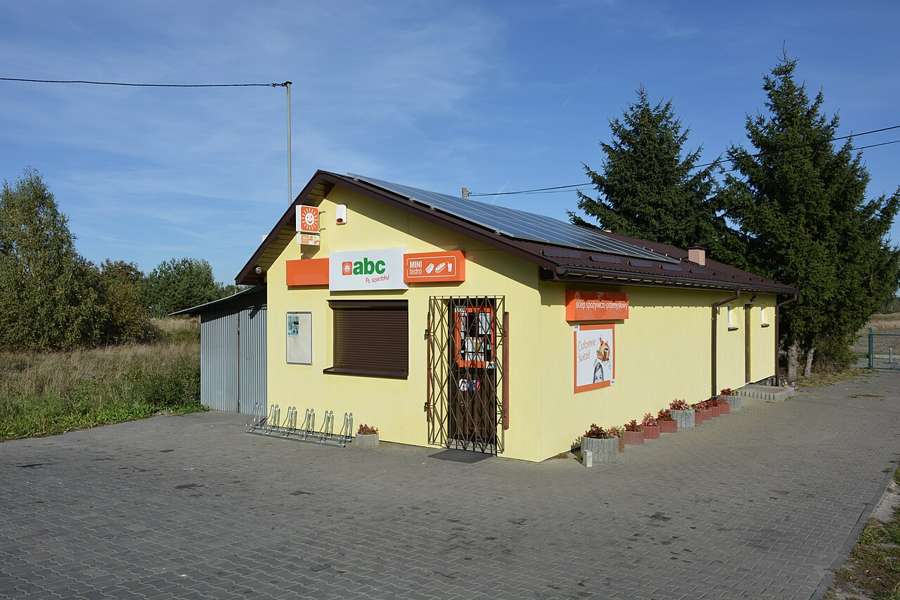 A small grocery shop with an abc sign on Mikołaja Kopernika street in Skarżysko-Kamienna