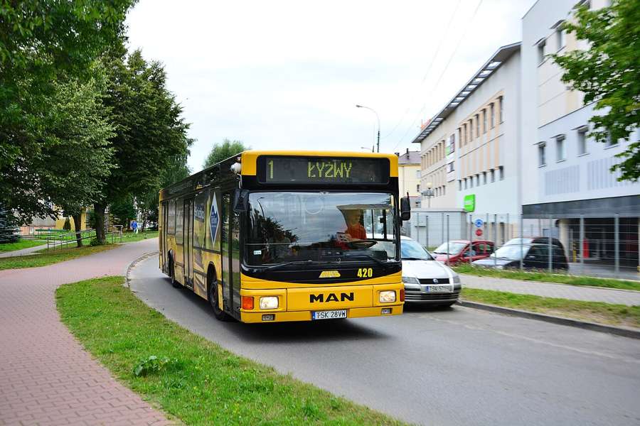 Yellow MKS MAN city bus driving through Skarżysko-Kamienna