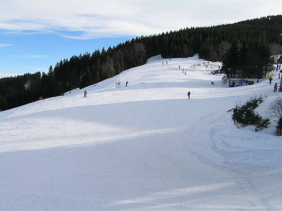 Ski slope with skiers on Skrzyczne in Szczyrk, Poland